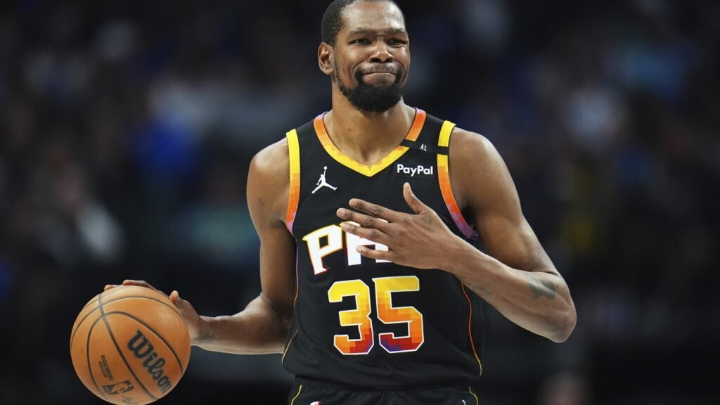 Kevin Durant is going from the Suns to the Rockets in a blockbuster trade, AP source says