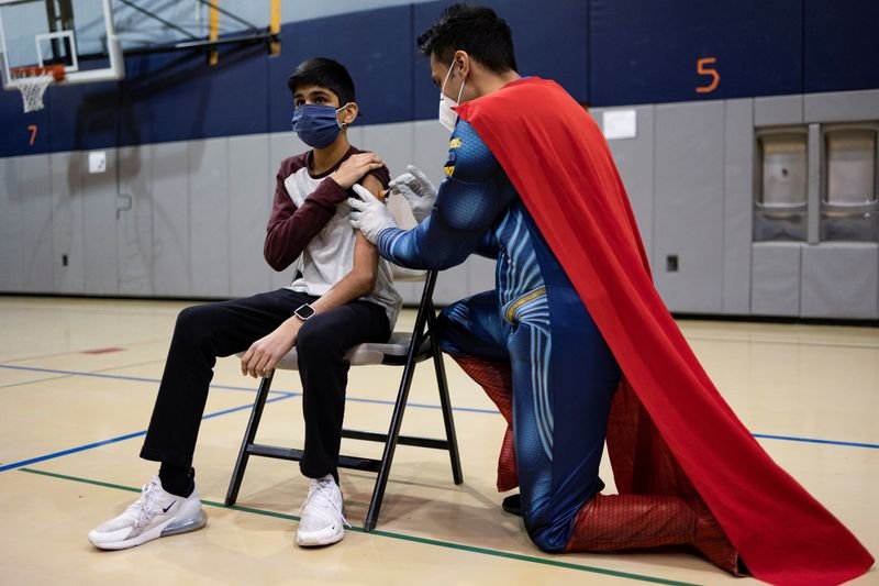 Pennsylvania pharmacist keeps vaccine Superman suit on hand