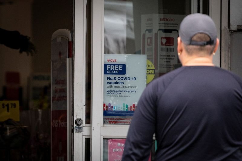 US health official calls for separating measles combination shots, pulls broad COVID vaccine support