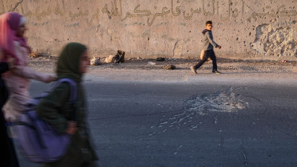 Syrian students return to schools in Idlib stripped bare by conflict